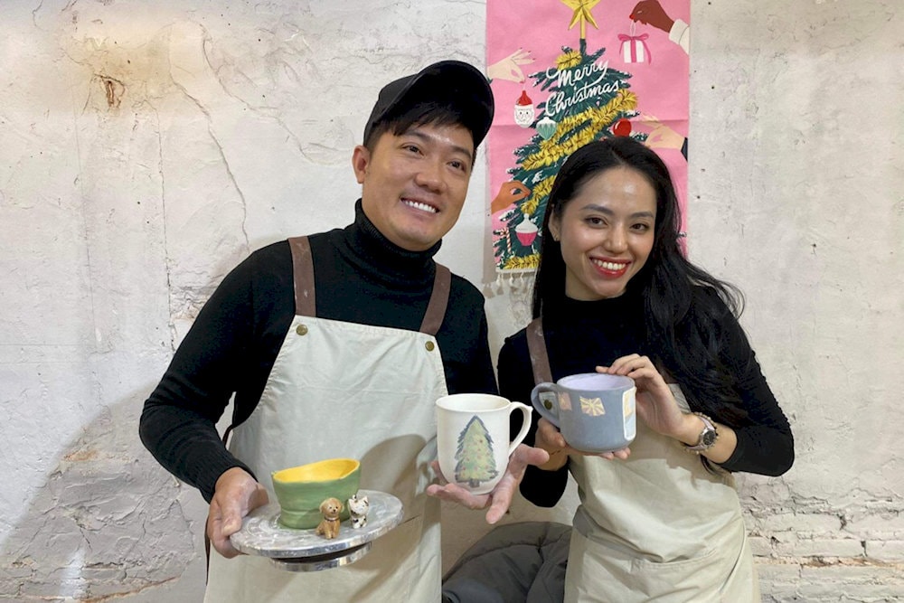 Visitors creatively shape clay into beautiful pottery